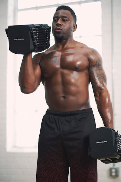 Powerblock pro 50 Adjustable dumbbells In Use By Male