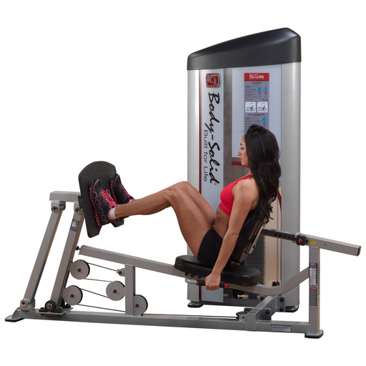 body solid pro clubline s2lpc leg press woman white background